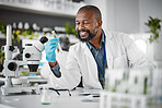 Science, sustainability and sample with a black man doctor working in a laboratory for research or innovation. Biology, microscope or healthcare with a male scientist at work in a lab for development