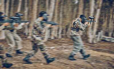 Buy stock photo Motion, blur and men running during paintball game, competition and military training in nature. War, field and friends moving with gun for battle, action and cardio in the woods or forest of Mexico