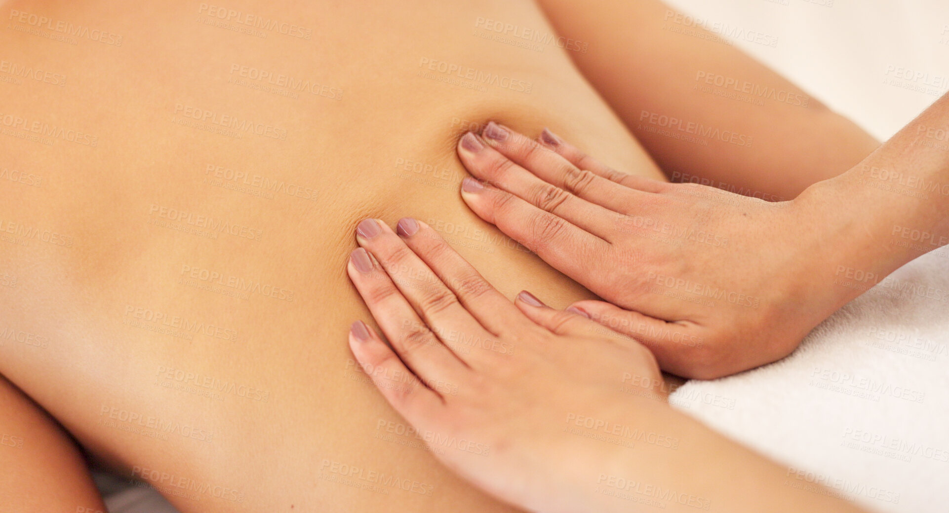 Buy stock photo Hands, massage and back of a spa customer on a table for wellness, luxury treatment or stress relief closeup. Relax, salon and skin with a beauty therapist massaging a person at a resort for health