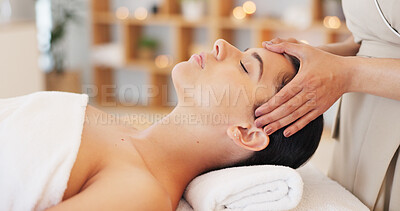 Buy stock photo Wellness, spa and woman with facial massage, luxury or peace with stress relief, skincare or mindset. Person laying on a tablet, client or girl with beauty, calm or resort with vacation or beautician