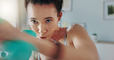 Buy stock photo Fitness, boxing and a sports woman training closeup with dumbbells in her home for health or wellness. Exercise, workout and cardio with a young female boxer in her apartment for a gym routine