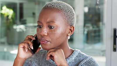 Buy stock photo Phone call, serious and business woman planning on mobile conversation for networking for startup company office. Listening, voice message and professional face of African planner in administration