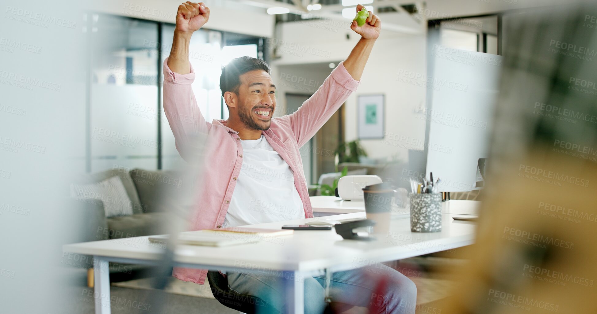 Buy stock photo Winner, wow and cheering with a business man reaching a goal or target in his office at work. Motivation, goals and success with a male employee in celebration of a deal or promotion while working