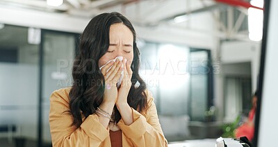 Blowing nose, tissue and woman sick with flu, cold or covid virus infection while working on creative ux web design. Medical healthcare, sneeze and Asian employee ill with winter sickness or allergy