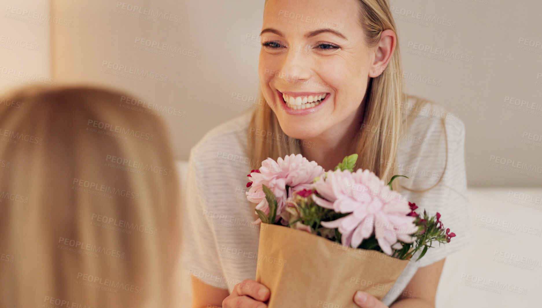 Buy stock photo Flowers, mothers day gift and happy girl in congratulations for birthday of family bonding together in home. Bouquet present, child and mom smile in gratitude, love and holiday celebration of women.