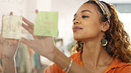 Sticky note, glass board and black woman planning startup success of clothes store, retail shop or fashion boutique. Small business owner working on strategy idea, sales target or goals manifestation