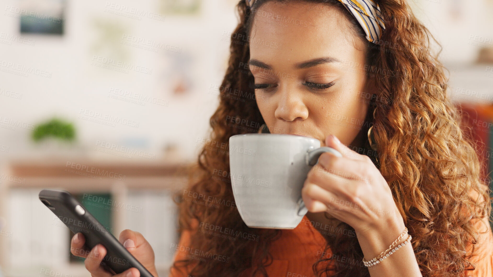 Buy stock photo Phone, coffee and communication with a black woman on social media while drinking from a mug in her home. Relax, mobile and internet with a young female enjoying a cup of caffeine in her house