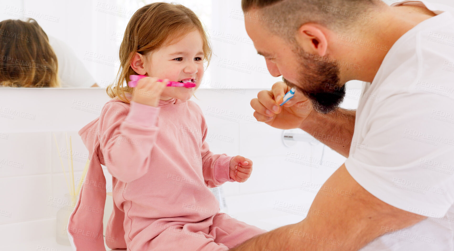 Buy stock photo Learning, dental and father with girl child brushing teeth, happy and playing in a bathroom, bond and love at home. Oral care, mouth and cleaning by kid and parent with toothbrush, teaching and fun