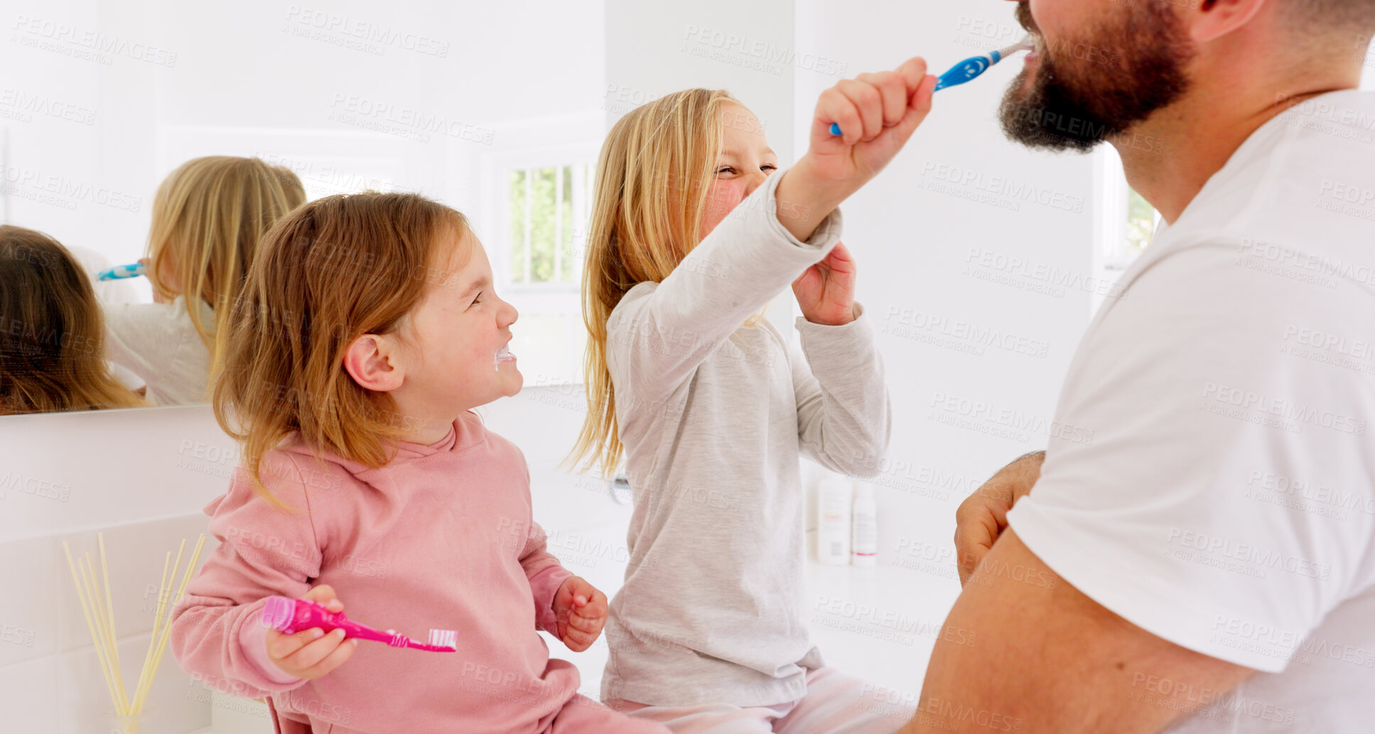 Buy stock photo Happy family, dental and kids brushing teeth with father in a bathroom playing, fun or bond while learning at home. Oral care, love and children with parent and toothbrush, smile or child development