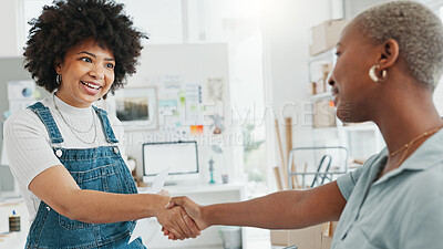 Business deal, agreement and shaking hands with a client or customer. Businesswoman making a deal for a purchase or meeting a new buyer in startup company in ecommerce, online and delivery business