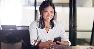 Business woman, phone and communication of a happy employee networking at a office desk. Company, corporate and worker with happiness texting, typing and working on a mobile phone with social media