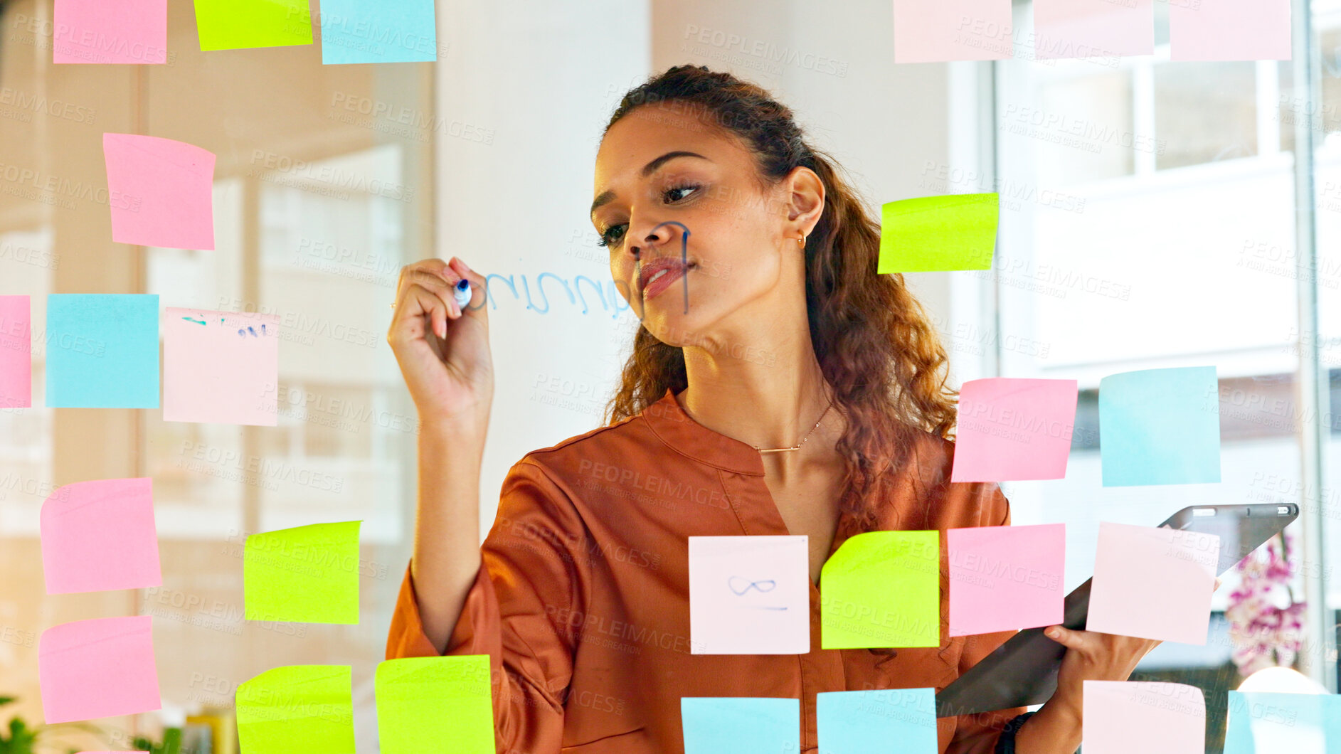 Buy stock photo Business woman, planning and writing on glass wall with notes for ideas or reminder in creative office. Designer person with strategy for brainstorming, management and scrum or agenda with memo