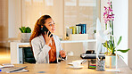 Human resource manager talking on a call with employee explaining a strategy or contract. Female hr assistant scheduling an interview or meeting with a client while sitting at computer desk inside