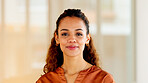 Face of a latino HR administrator smiling inside a room. Portrait of a happy, confident and beautiful Human Resource professional woman, specialist or administrative assistant at a corporate company