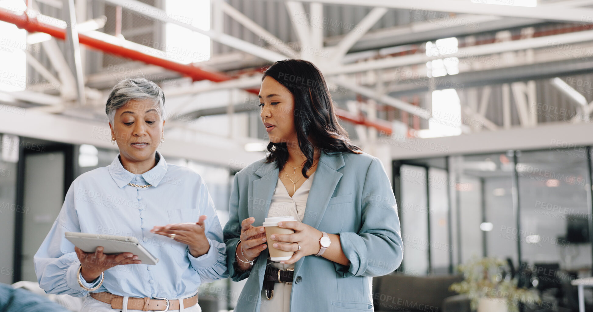 Buy stock photo Mentor, tablet and senior woman with employee, talking and walking in office for online research. Business women, administrator or mature manager in conversation for schedule on website in workplace