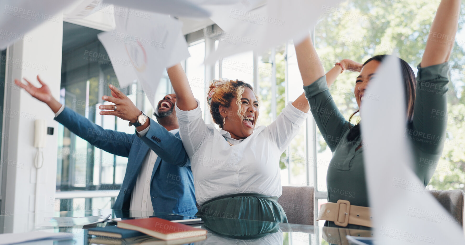 Buy stock photo Achievement, paper in air and business people in meeting with corporate win, celebration and cheers in office. Confetti, success and support with team building, happy employees coworking and bonus