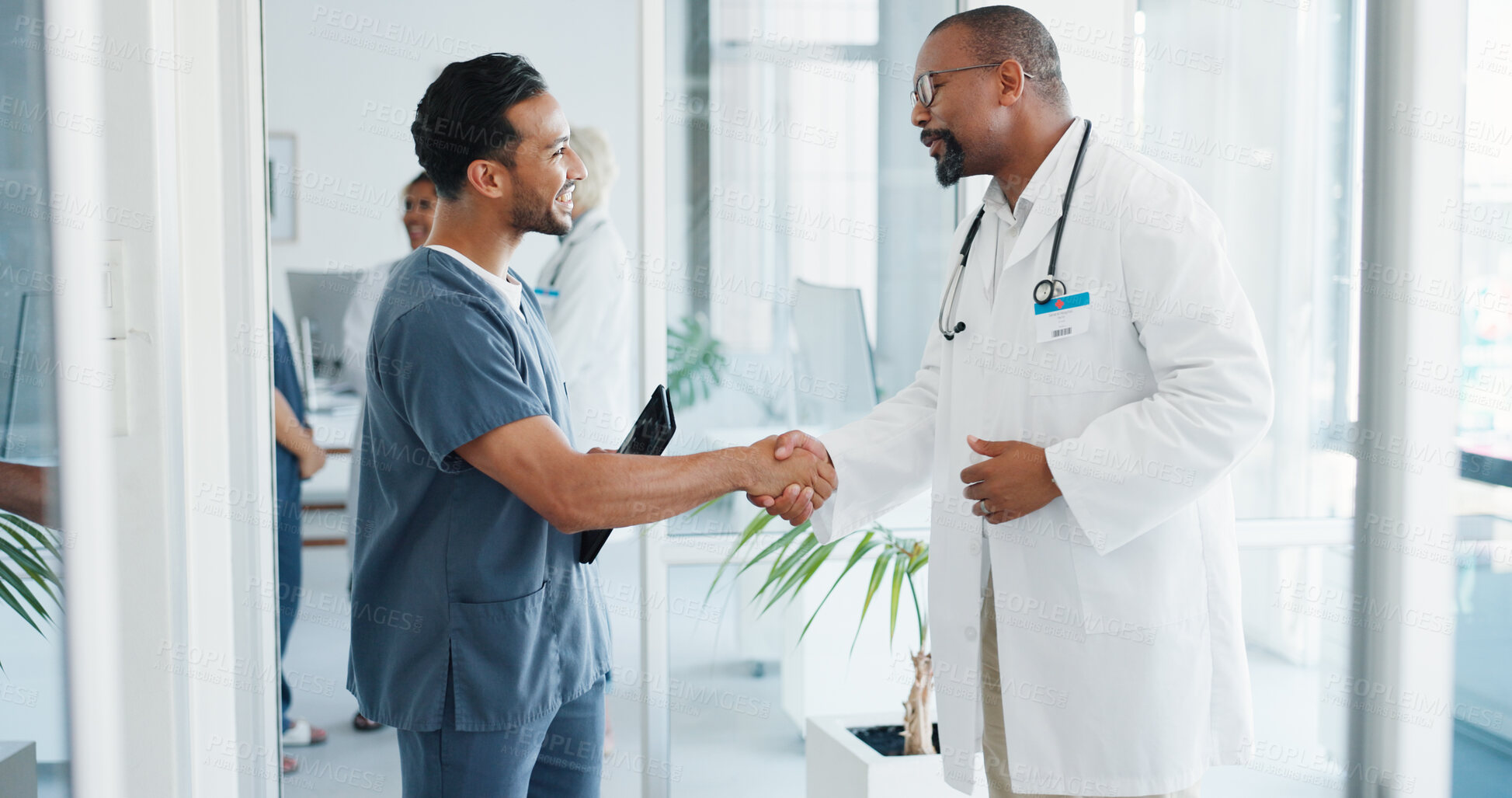 Buy stock photo Doctor, nurse and handshake in teamwork, partnership or meeting in agreement, deal or greeting at hospital. Medical or healthcare professional shaking hands in team support, advice or help at clinic