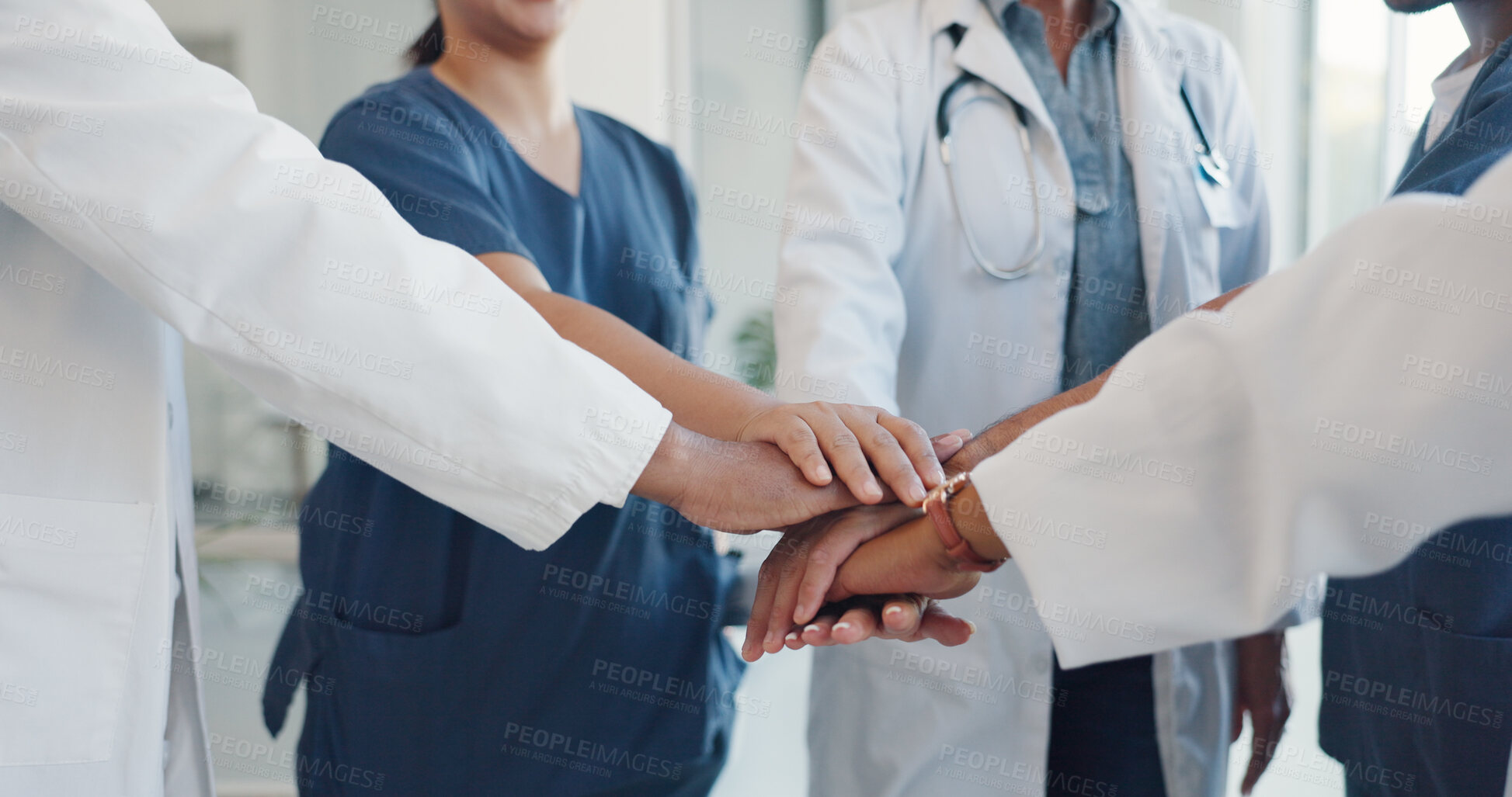 Buy stock photo Doctor, team and hands together in meeting, collaboration or motivation in trust, support or unity at hospital. Closeup of medical group or healthcare people piling in teamwork, goals or mission