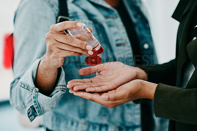 Buy stock photo Closeup of woman cleaning themselves with hand sanitizer, medical and healthy during the pandemic. Health, hygiene and safety adults clean their hands to stop the spread of covid in office space.