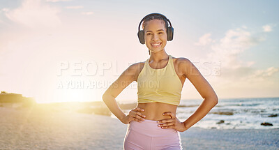 Buy stock photo Fitness, exercise and portrait of woman at the beach in morning for healthy lifestyle, wellness and cardio. Sports, nature and happy woman ready for training, running and workout with headphones
