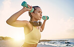 Health, woman and exercise on beach, fitness and workout for wellness, sports and training. Female, girl and athlete practice, seaside and healthy lifestyle for body care, headphones and weights.