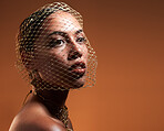 Net veil, elegance and face of a woman with fashion idea isolated on a brown studio background. Thinking, makeup and stylish vintage model with a fancy, retro and glamour accessory on a backdrop