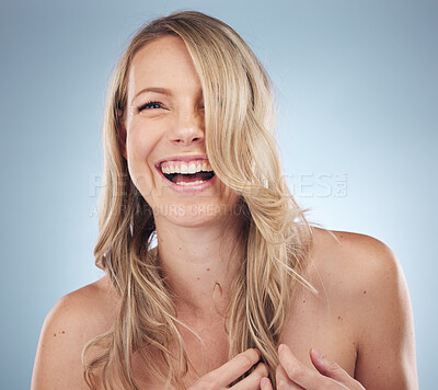 Buy stock photo Beauty, skincare and funny with a model woman in studio on a gray background enjoying a joke or humor. Facial, cosmetics and fun with an attractive young female laughing for natural treatment