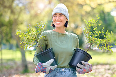 Buy stock photo Plants, gardening and woman volunteering for agriculture, growth project and sustainability on earth day. Park, natural environment and community service worker, farmer or person with trees in forest
