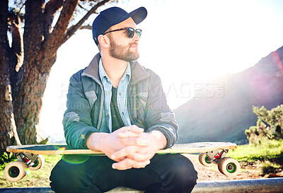 Buy stock photo Skateboard, sports and man thinking on mountain for adventure, freedom and ready for skateboarding. Urban fashion, fitness and profile of skater with board for exercise, skating and training outdoors