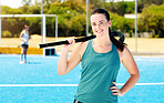 Happy woman, hockey stick and portrait of a sport player on outdoor field. Happy person, smile and and sun with a sports female ready for game training, exercise and fitness workout with happiness 