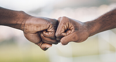 Buy stock photo Fist bump, closeup and hands celebrating as teamwork on sports field winning and power of working together. Team, support and unity of teammates in collaboration or partnership with motivation