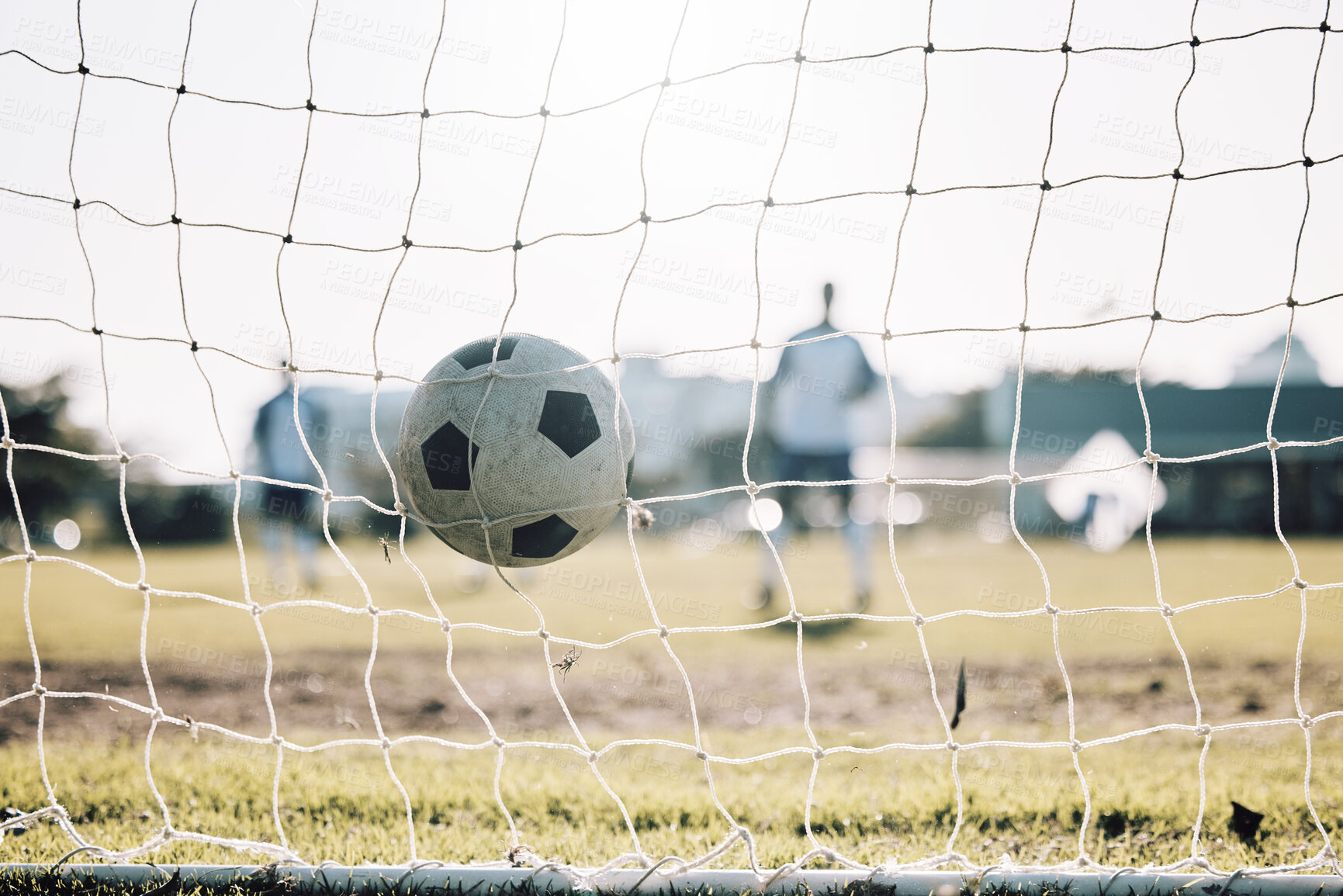 Buy stock photo Sports, winner and soccer ball in net after goal, score and winning on field for training, practice and game match. Motivation, football club and players outdoors for fitness, exercise and workout