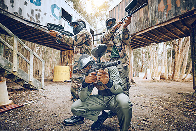 Buy stock photo Paintball teamwork, shooting together and war game with vision, mask or tactical strategy for safety in competition. Military training, team building or group for weapon, formation or friends outdoor