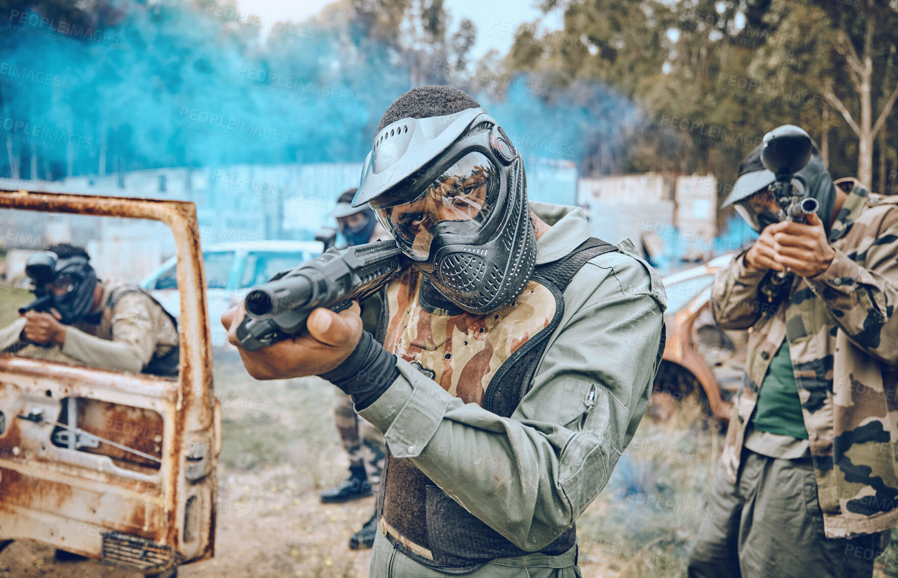 Buy stock photo Paintball, teamwork and shooting with people in field for sports, target and fitness games. War, smoke and community with man gamer playing in camouflage for military, army and competition training