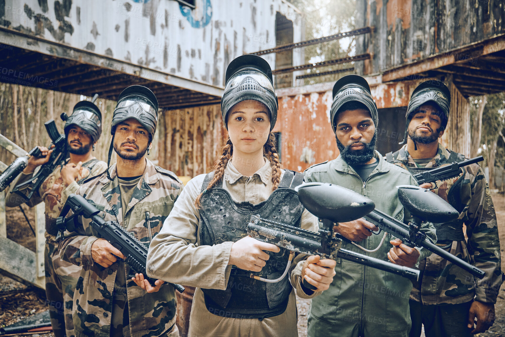 Buy stock photo Paintball, team portrait and woman leader with gun for sports game, competition or action challenge. Diversity men and female group for military, soldier or army mission in outdoor war battlefield