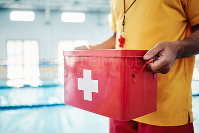 Buy stock photo Box, safety or hands of a lifeguard by a swimming pool helping rescue the public from water danger or drowning. Zoom, trust or man with a medical kit ready for emergency injury support in an accident