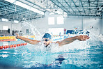 Man, breathing or butterfly stroke in swimming pool cap for sports wellness, training or exercise for body healthcare. Workout, fitness and swimmer athlete in motion for water competition challenge
