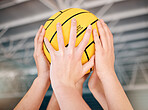 Hands, ball and team with sports and support with athlete group, teamwork and fitness with solidarity and trust. Collaboration, community and exercise, volleyball or water polo and people play game 