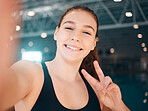 Peace sign, selfie and portrait of a woman athlete after a swimming exercise, training or competition. Fitness, sports and happy female swimmer taking a picture with a hand gesture after a workout.