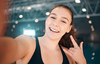 Buy stock photo Selfie, rock and portrait of a girl at a gym for fitness, running and health with a sign for a workout. Happy, sports and face of a girl with a photo, hand emoji and smile for exercise and sport