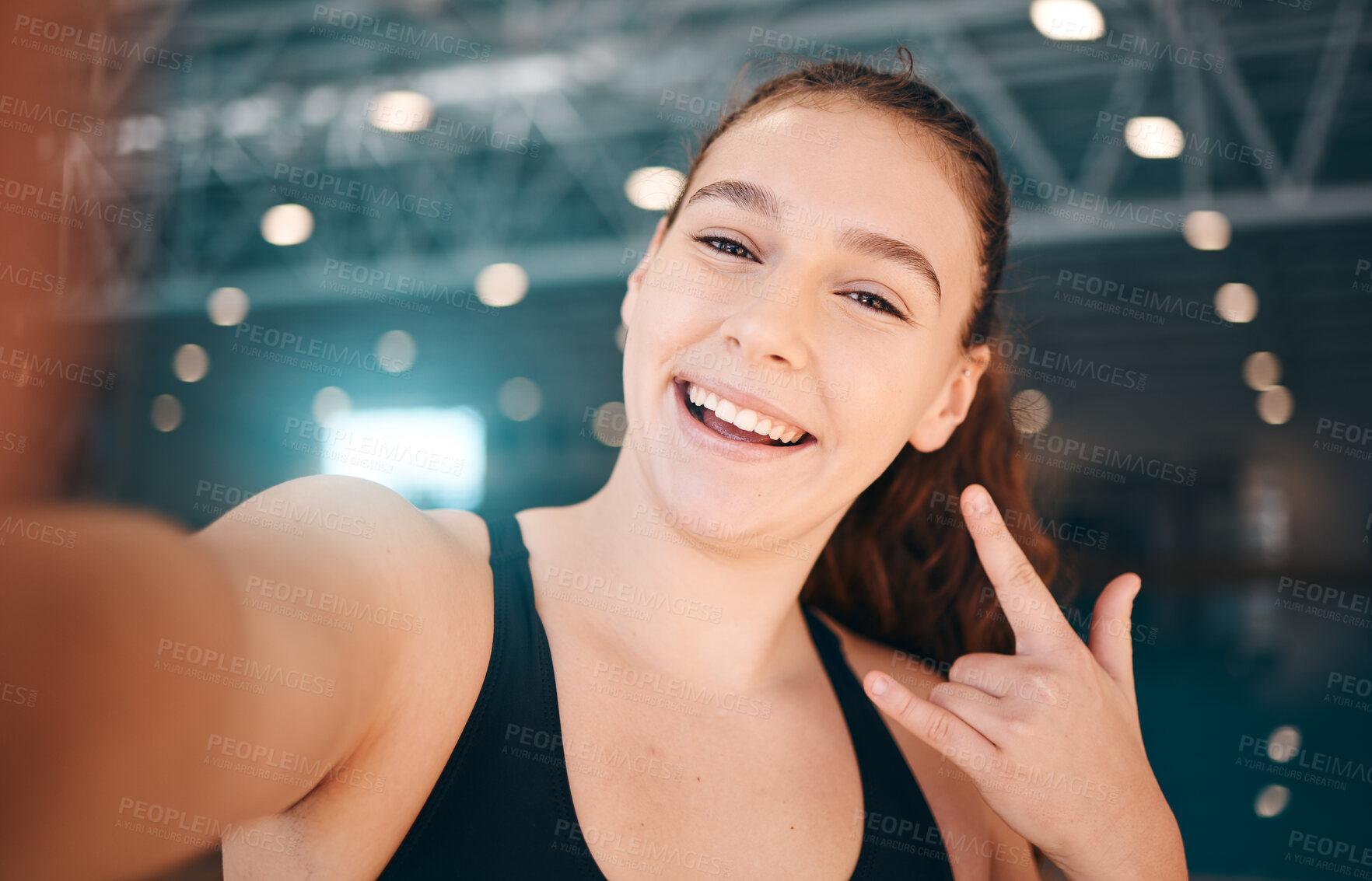 Buy stock photo Selfie, rock and portrait of a girl at a gym for fitness, running and health with a sign for a workout. Happy, sports and face of a girl with a photo, hand emoji and smile for exercise and sport