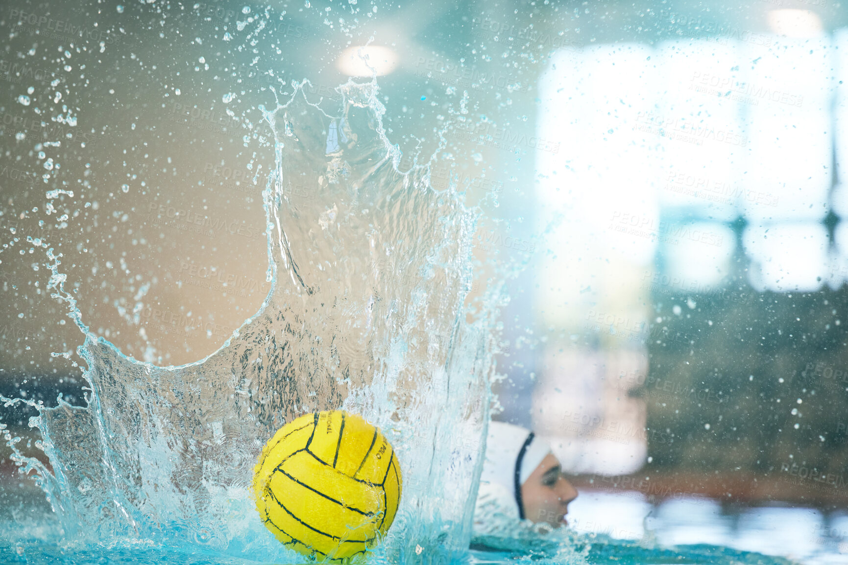 Buy stock photo Water polo, ball and splash with athlete in swimming pool training, exercise and fitness game or sports event. Professional swimmer, person or woman in competition, challenge stroke and object action