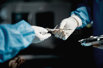 Buy stock photo Surgeon, hands and medical scissors for a surgery on a emergency, operation or surgical room. Healthcare, people and team of doctors operating on a patient with steel tools in a medicare hospital.