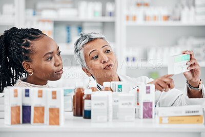 Buy stock photo Pharmacy, help and customer with medicine information at drugstore, advice and label check by friendly worker. Senior lady, pharmacist and black woman consulting for pills, treatment and questions