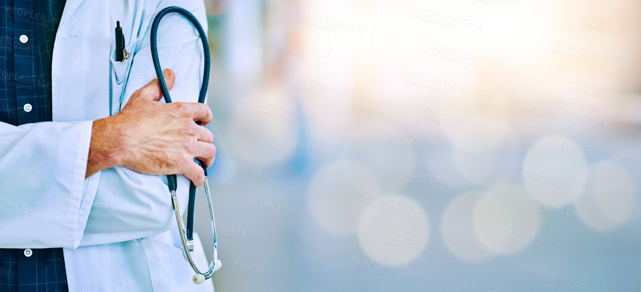 Buy stock photo Hand, stethoscope and healthcare on mockup with a doctor man standing in a hospital for insurance. Medical, trust and mock up with a male medicine professional in a clinic for health or treatment