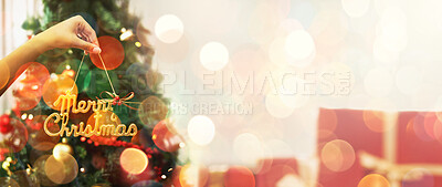 Buy stock photo Christmas, celebration and tree decoration for holiday with mockup space and bright lights or lens flare. Jolly, Xmas and festive decor by hand at a party in December in winter and presents or gifts