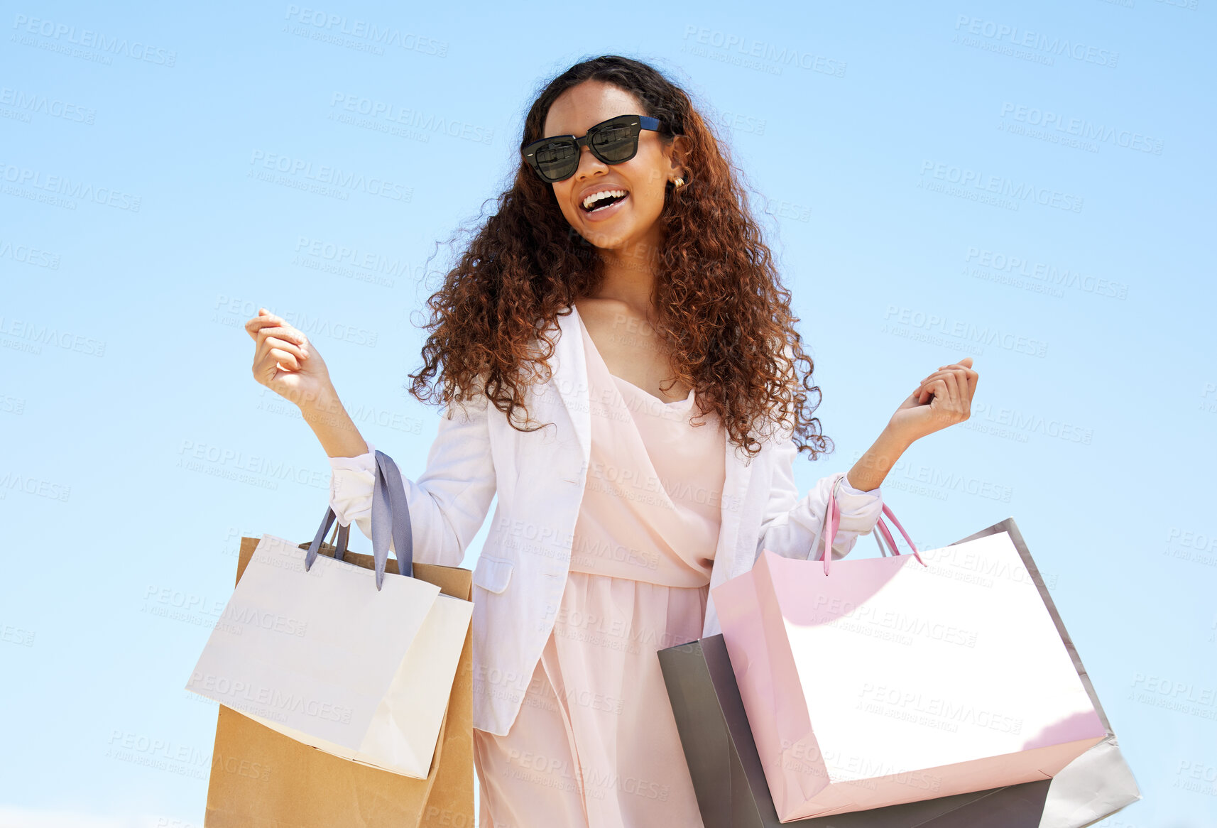 Buy stock photo Woman, shopping and happy customer in city for a sale, promotion or luxury brand discount. Person with a smile for designer fashion, retail and paper bag while walking outdoor on holiday in Milan