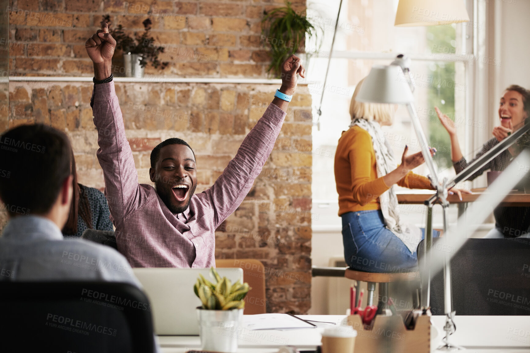 Buy stock photo Wow, success and black man in happy celebration at work after sales, goals or reaching target in an office. Job promotion, winner or excited employee with arms in the air to celebrate winning a deal 