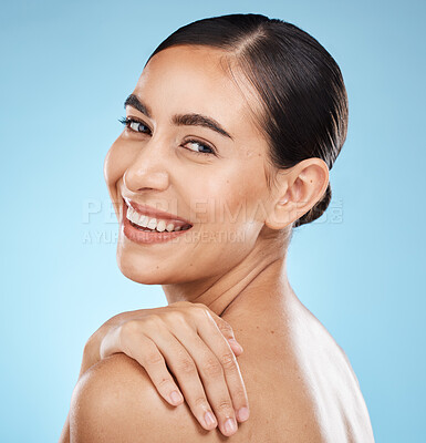 Buy stock photo Skincare, self care and portrait of a model in a studio for beauty, cosmetic and facial treatment. Cosmetics, happy and woman from Brazil with a healthy face routine isolated by a blue background.