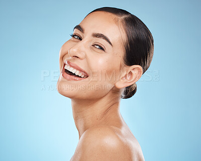 Buy stock photo Portrait, skincare and woman with smile, cosmetics and dermatology against blue studio background. Face detox, female and lady with happiness, wellness and morning routine for grooming and treatment